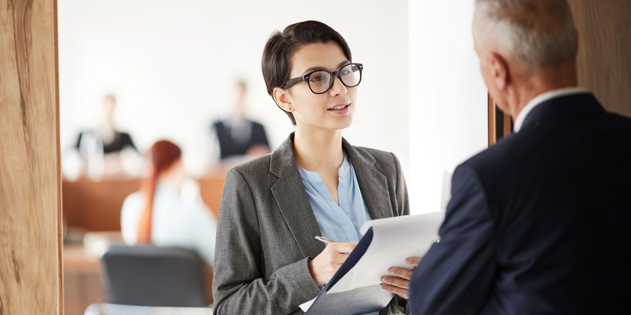 A business journalist interviewing a company executive.